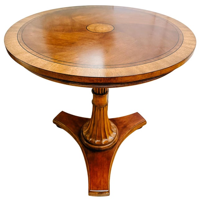 Elevate your space with the timeless elegance of this vintage Ethan Allen round accent table. True to the brand's legacy...