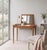 Elegant vanity table in teak, produced in Denmark during the 1960s. The design features slender proportions, clean lines,...