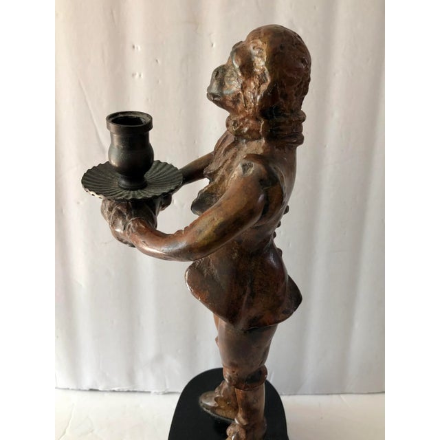 This Victorian Style Bronze Butler Monkey Candle Holder is most certainly a conversation starter with its statuesque size...