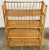 Vintage four-shelf unit made with striking scorched bamboo finish. Unit collapses to flat for efficient storage. Age wear....