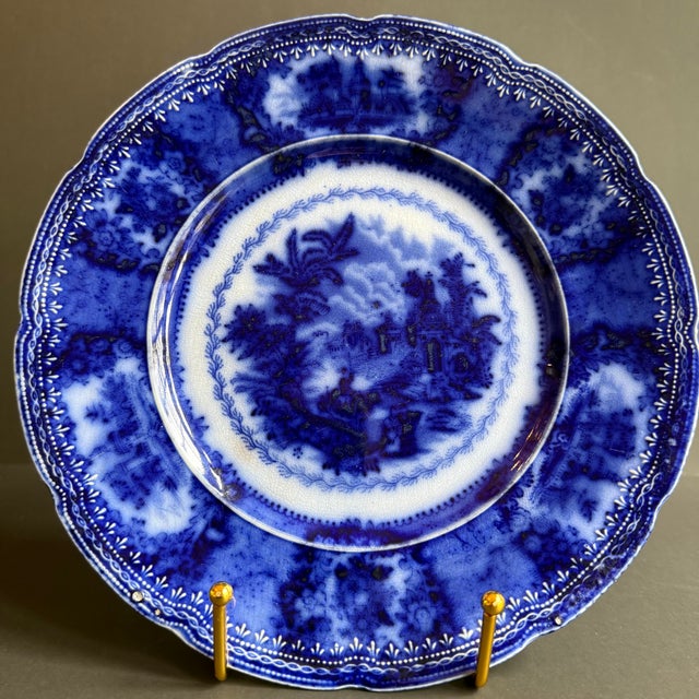 Flow Blue transferware plate in the Oriental pattern by New Wharf Pottery Company in England. 9" plate has rich deep...