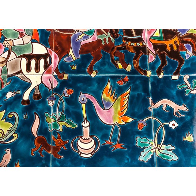 Wrought iron coffee table. Top in ceramic tiles from the Benedictine Abbey Saint-Paul de Wisques. The decoration...