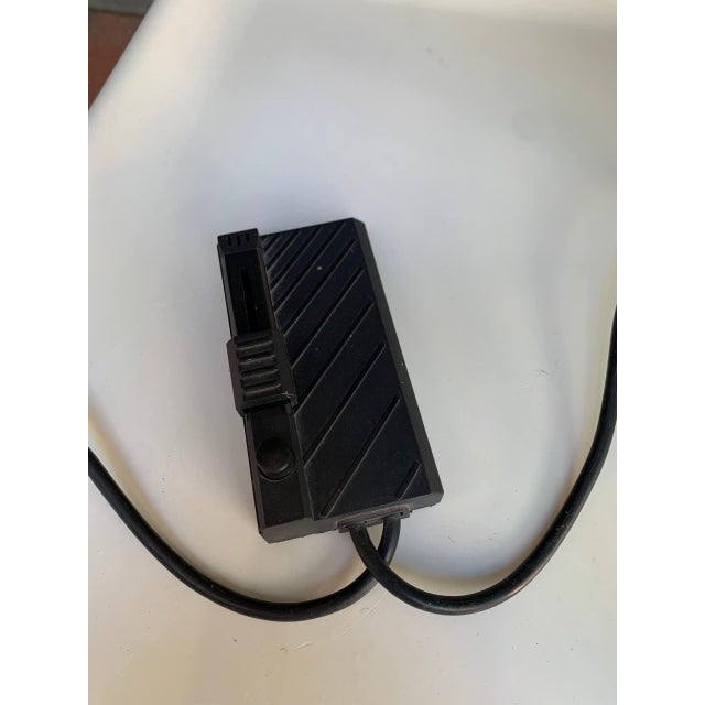 This exceptional lamp, designed by Elin Raaberg Nielsen in 1986 and produced by the famous Vistosi house, combines a...