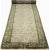 Handwoven wool and silk Indian rug featuring Tibetan design with a mushroom colored field and olive border accented in...
