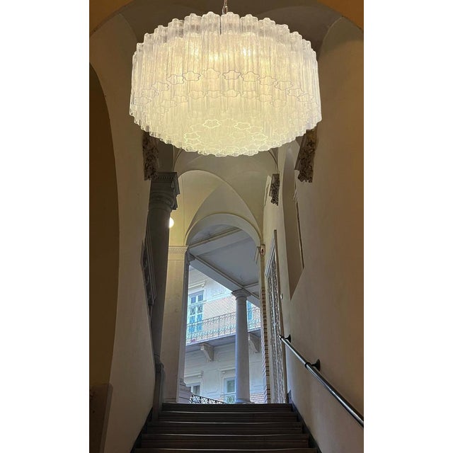 Italian vintage chandeliers in Murano glass and nickel plated metal structure. The armor polished nickel supports 101...