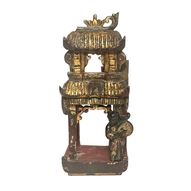 An exceptional pair of 18th century Chinese architectural fragments, hand carved from wood and shaped in the likeness of...