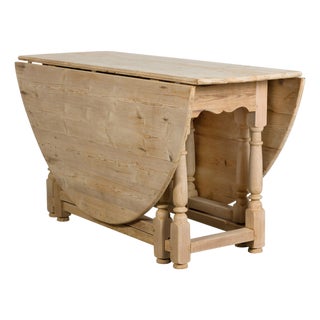 English Pine 19th Century Drop Leaf Table with Oval Top and Carved Apron For Sale