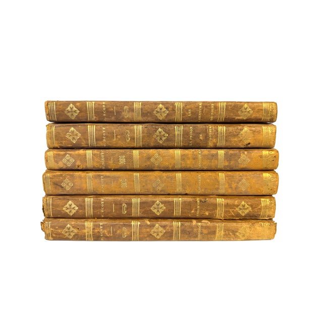 An exquisite set of six antique 19th century French edition volumes of Walter Scott's iconic works, published in Paris in...
