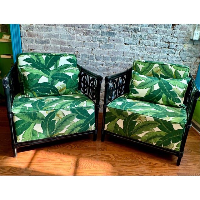 These large vintage black rattan chairs have been thoughtfully refurbished with new upholstery in Tommy Bahamaâ€™s Swaying...