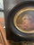This type of small, oval-shaped 19th century oil on canvas painting is commonly known as a portrait miniature, often...