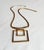 Vintage 1970s modernist statement necklace featuring two interlocking open square pendants suspended from a curved...