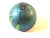 Featuring a spider in its web entangling a flower, this beautiful Art Glass paperweight is signed Orient & Flume 1979. The...