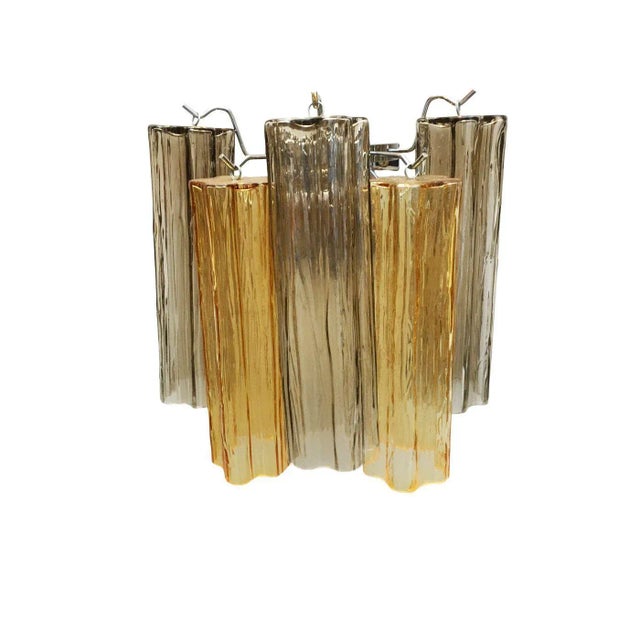 Contemporary smoked fume’ and amber “TRONCHI” wall sconce. Hand-made in tronchi in Murano glass. European Plug (up to 250V).