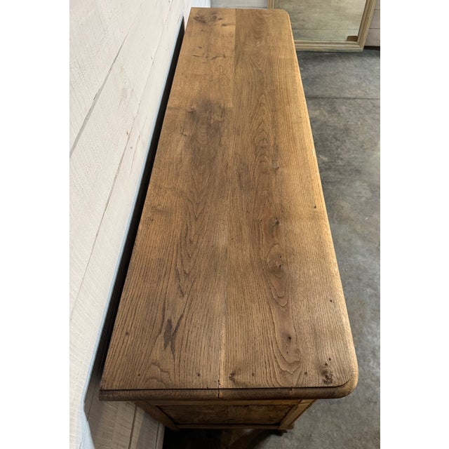 A really nice French Oak Enfilade or Sideboard dating to around 1800. Having a nicely carved front, original backboards, 3...