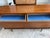 Absolutely stunning mid century modern walnut lowboy dresser featuring sleek, clean lines, sculpted drawer pulls, and...