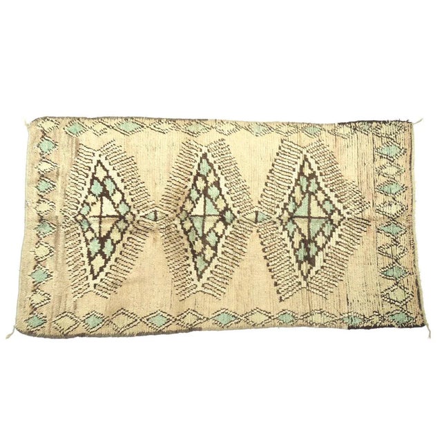 Gorgeous vintage Boujad rug handwoven with soft ivory, ecru, brown and aqua colored wool in an elaborate Berber pattern....