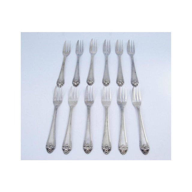 Silver Cake Forks with Trims and Shells on the Handles, Set of 12, in Very Good conditions. Designed 1920 to 1949 This...