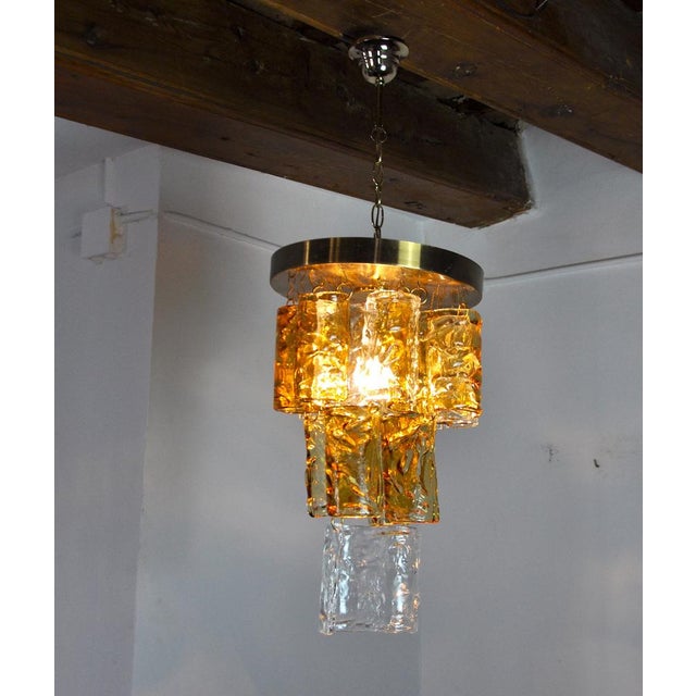 Superb and rare waterfall chandelier designed and produced by zero quattro in the 70s in murano, italy. Golden structure...