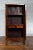 19th Century Chinese Qing Dynasty Brown Finish Cabinet with Carved Apron For Sale - Image 10 of 13