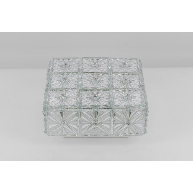 Wonderful light fixture in style of kinkeldey, germany, manufactured in circa 1960-1969. The white color fixture is made...