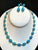 This Natural Sleeping Beauty Turquoise & Diamond Tennis Necklace & Earrings Set is a true masterpiece that showcases the...