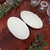 These Limoges scalloped oval serving platters are a matching set of two vintage French porcelain serving pieces, each...