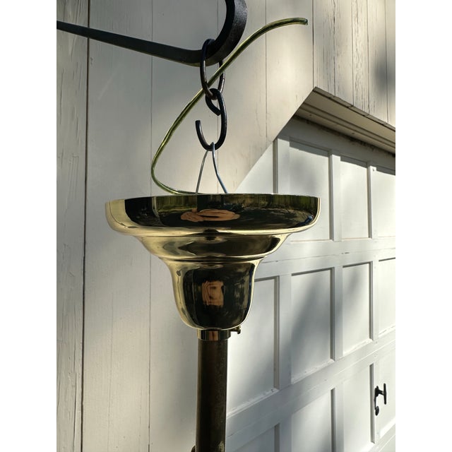 Old Lights On is please to offer this vintage glass heart shaped shade with brass hanging fixture. Shade has slight purple...