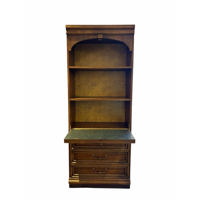 This vintage wooden secretary bookcase seamlessly combines classic style with practical, space-saving functionality. The...