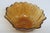 This beautiful Sunflower Shaped Bowl is made of glass. This lovely Bowl has a wonderful warm Amber color throughout the...