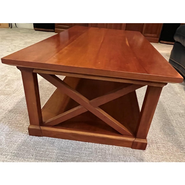 This is a beautiful, high‑quality coffee table from Restoration Hardware, built with solid wood and classic craftsmanship....