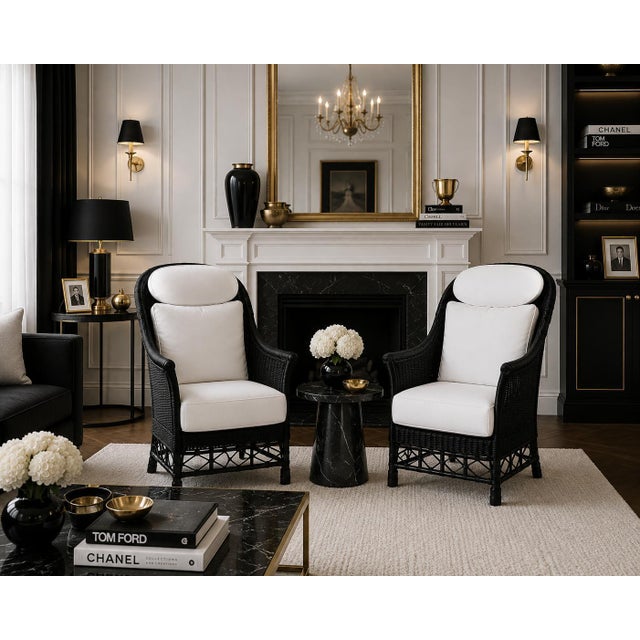 An elegant and distinctive pair of Karen Blixen armchairs, manufactured by the Danish company Søren Lund Møbler. The...
