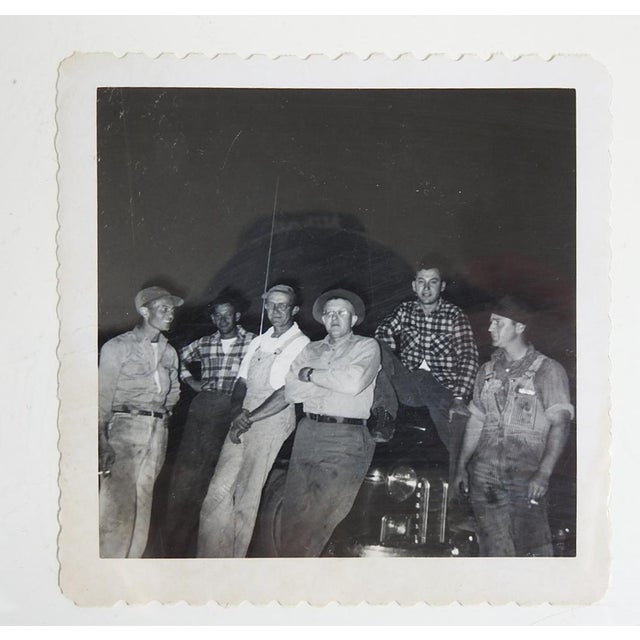 Mid 20th century black and white snapshot photograph of a group of hard working men on a break. Unframed.