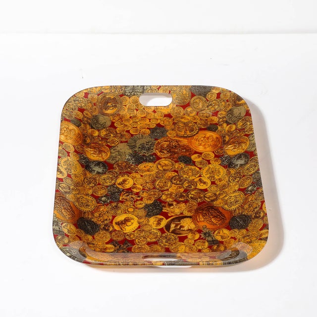 This boldly scaled and patterned Mid-Century Modernist Tray W/ Ancient Coin Pattern is by Fornasetti and origiantes from...
