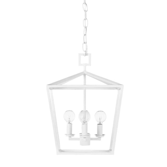 The Denison White Small Chandelier is a hammered wrought-iron fixture in a gesso white finish. This classic lantern shape...