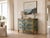 Vintage dresser covered with GP & J Baker- Ramayana Emerald Green. Original brass handles. This piece is designed in the...