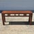 This is a traditional Asian style carved elm wood bench that measures 44” long, 11.25” deep, and 19.5” tall. It can be...
