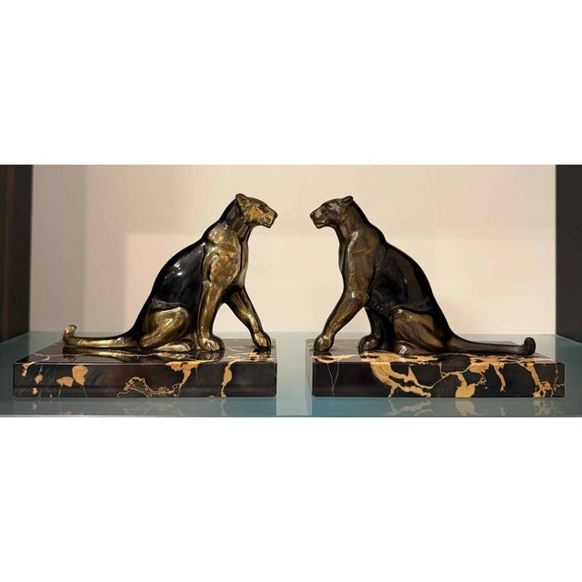 Elegant pair of Art Deco sculptural bookends, made in France in the 1930s and signed by the sculptor Tedd. The bookends...