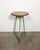 Vintage Industrial factory stool made in former Czechoslovakia during the 1960s It features a plywood seat and a green...