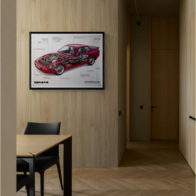 The Piece This original vintage poster from 1982 presents a sophisticated technical cutaway of the Porsche 944. Set...
