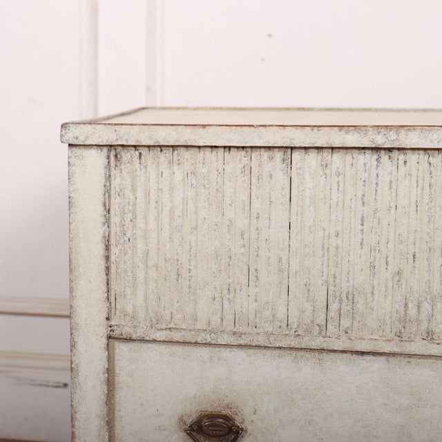 Unusual 19th C Dutch painted oak bedside cabinet with false drawer and tambour front. 1860 This piece is designed in the...