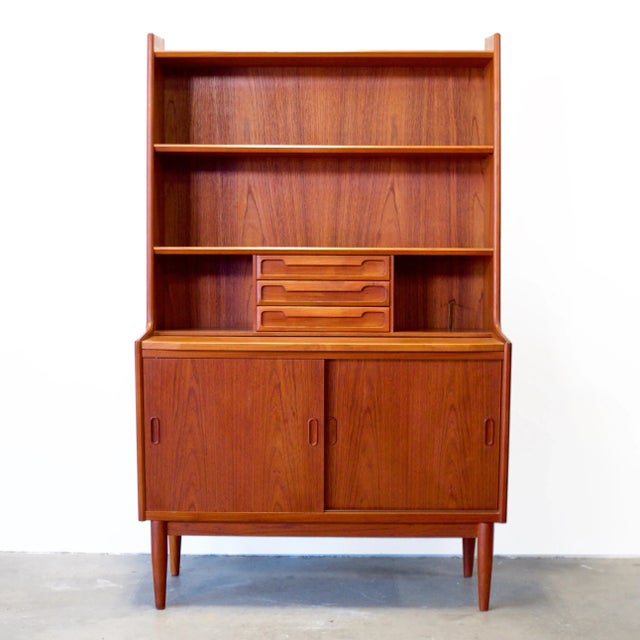 Dimensions: 39 1/2” L x 19” D x 64 1/4” H / Desk Height: 29 3/8” H Origin: Vivild, Denmark Designer: Unknown Manufacturer:...