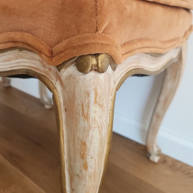 Pair of 2 square, Louis XV-style wood stools with orange, velvet upholstery. The wood was treating using patina (slight...