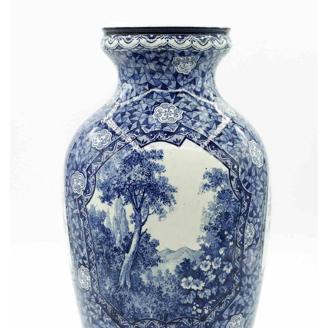 Blue ceramic vase realized by Franz Anton Mehlem in Bonn (Germany) the late 19th century. Glazed ceramic...