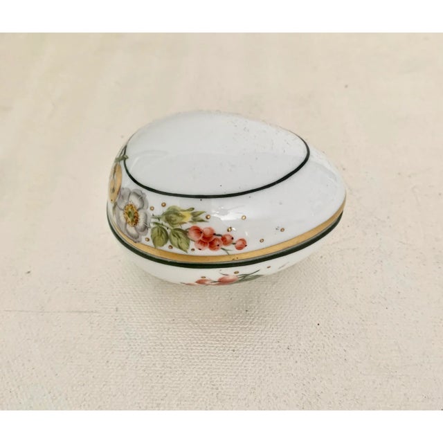 What a rare find! This small egg shaped box was made in small quantity for Herend’s 175th anniversary and bears the...