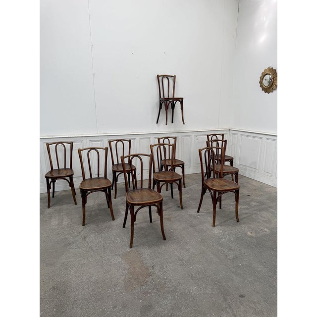 Made in the 1930s from beech wood, these authentic bistro chairs by FISCHEL have been fully cleaned and restored in our...