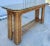 This is a vintage coastal organic modern rattan wrapped console table. Rattan and glass console tables are a type of...