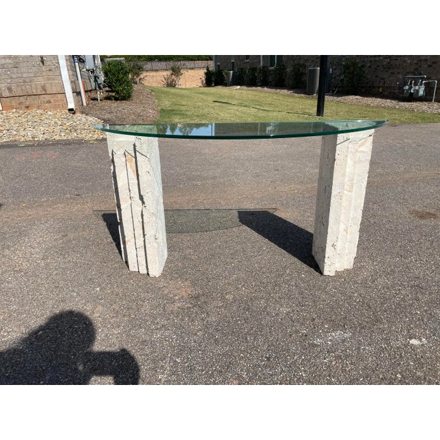 Coquina stone table on offer. Manufactured in the 1970's, no two Coquina items are the same. Demilune glass sits atop two...