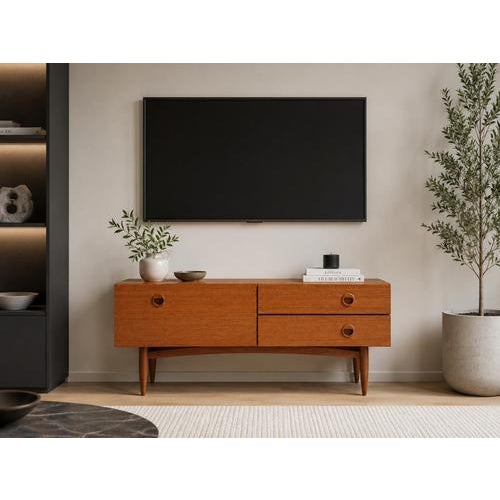 Teak Sideboard with Flap, 2 Drawers, and Conical Legs This stylish sideboard made of teak combines functionality with a...