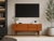 Teak Sideboard with Flap, 2 Drawers, and Conical Legs This stylish sideboard made of teak combines functionality with a...