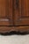 A beautiful French provincial corner cabinet crafted in solid walnut and dating to the late eighteenth century. Designed...